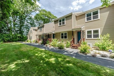Step into this welcoming townhouse style unit located in - photo 2