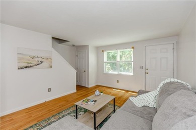 Step into this welcoming townhouse style unit located in - photo 3