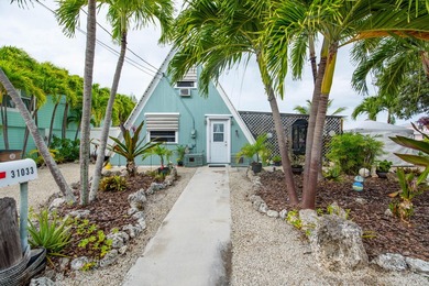 Nestled in the heart of Big Pine Key, this charming A-frame home - photo 2