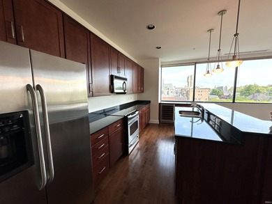 Experience vibrant downtown living in this spacious 2-bedroom