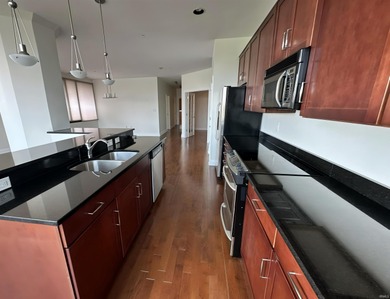 Experience vibrant downtown living in this spacious 2-bedroom