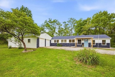 Fully renovated, this private 3bd/3ba lakeside ranch home, sits - photo 2