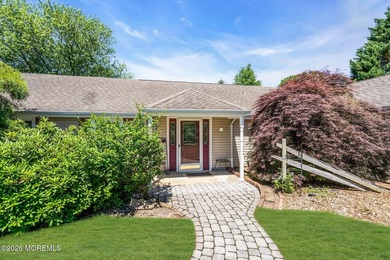 Nestled on 1.59 acres of beautifully landscaped property, this - photo 2