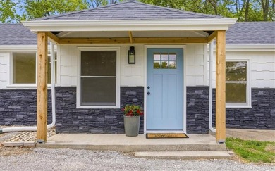 Fully renovated, this private 3bd/3ba lakeside ranch home, sits - photo 4