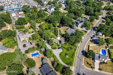 Nestled on 1.59 acres of beautifully landscaped property, this - photo 4