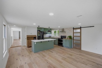 Fully renovated, this private 3bd/3ba lakeside ranch home, sits - photo 6