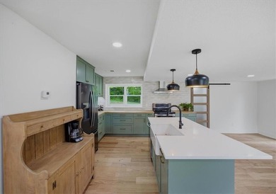 Fully renovated, this private 3bd/3ba lakeside ranch home, sits - photo 8