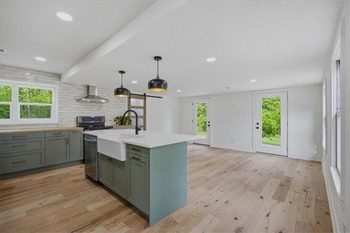 Fully renovated, this private 3bd/3ba lakeside ranch home, sits - photo 10