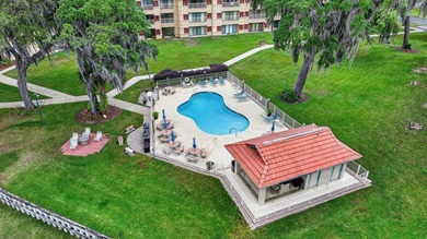 First-floor unit with breathtaking river views! Don't miss this - photo 4
