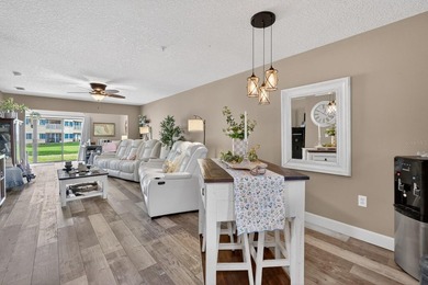 First-floor unit with breathtaking river views! Don't miss this - photo 7