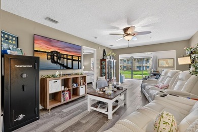 First-floor unit with breathtaking river views! Don't miss this - photo 9