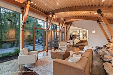 Nestled on two lush acres along the picturesque Roaring Fork - photo 11