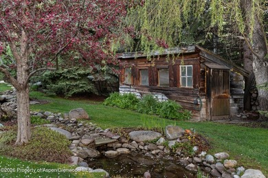 Nestled on two lush acres along the picturesque Roaring Fork - photo 22