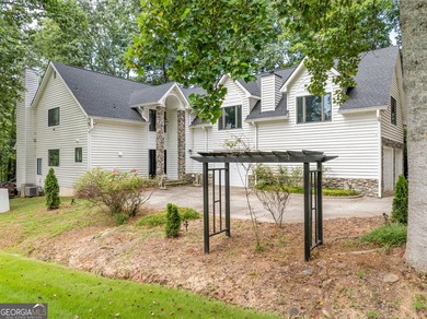 Set along the shores of Lake Lanier, this thoughtfully designed - photo 7