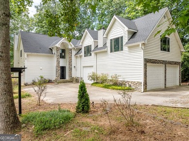 Set along the shores of Lake Lanier, this thoughtfully designed - photo 8