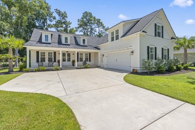 Built in 2023, this like-new home combines modern design - photo 1