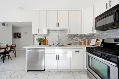 This corner-unit features views of Mount Soledad from several - photo 8