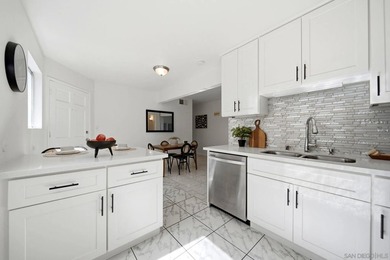 This corner-unit features views of Mount Soledad from several - photo 9
