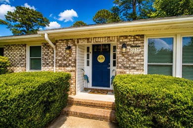 Situated on a spacious corner lot surrounded by mature trees - photo 1