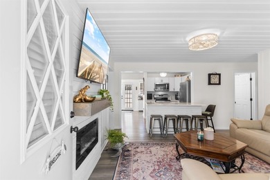 Your quintessential coastal retreat awaits. This immaculate - photo 2