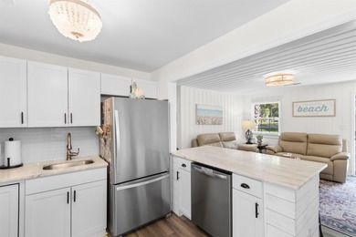 Your quintessential coastal retreat awaits. This immaculate - photo 5