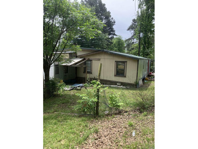Tucked away on approximately 1 acre, this versatile manufactured - photo 5