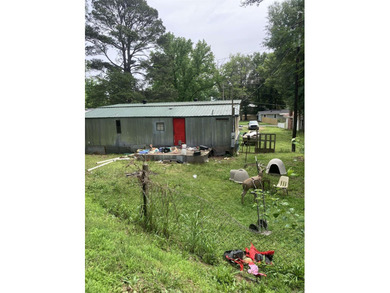 Tucked away on approximately 1 acre, this versatile manufactured - photo 7