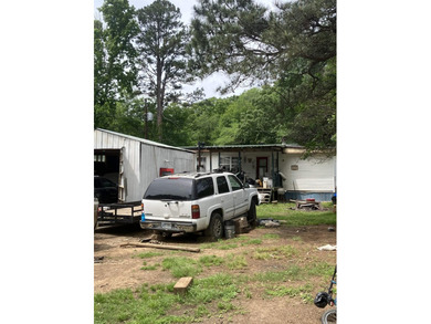 Tucked away on approximately 1 acre, this versatile manufactured - photo 9