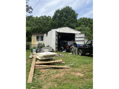 Tucked away on approximately 1 acre, this versatile manufactured - photo 10