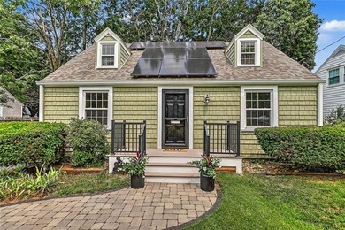 Welcome to this charming Cape Cod home in the desirable