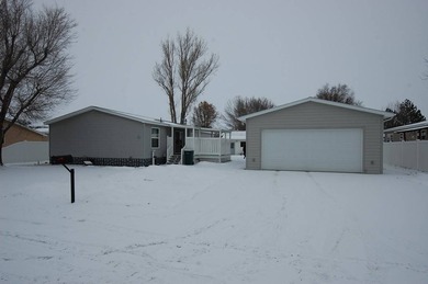 Lake Home For Sale in Sidney, Montana