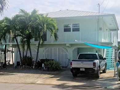 Boater's Paradise with Direct Open Water Access! Nestled on a - photo 1