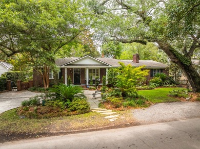 Welcome to 114 Live Oak Drive, a charming three-bedroom - photo 1