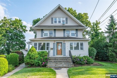 This income-producing two-family home lies in the heart of - photo 1