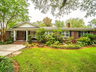 Welcome to 114 Live Oak Drive, a charming three-bedroom - photo 2