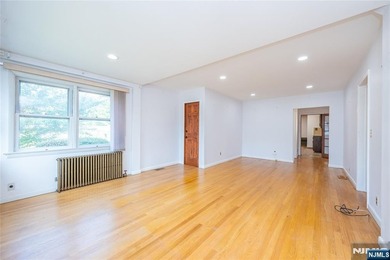 This income-producing two-family home lies in the heart of - photo 4