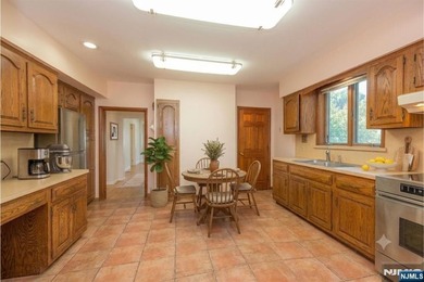 This income-producing two-family home lies in the heart of - photo 5