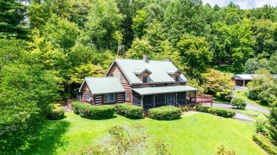 Step into timeless mountain living with this 3-bedroom, 3-bath