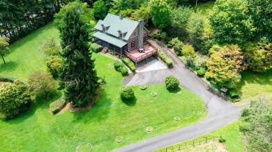 Step into timeless mountain living with this 3-bedroom, 3-bath