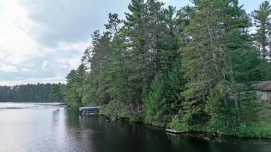 Build your Northwoods dream on this beautiful 0.34-acre wooded - photo 7