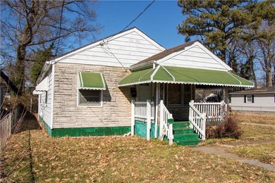 Diamond in the rough with strong potential. This 3-bedroom - photo 4