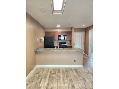 Rarely available, this beautifully updated third-floor condo - photo 5