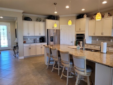 Stunning Pinnacle model overlooking the golf course and lake in - photo 8