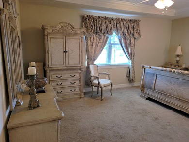 Stunning Pinnacle model overlooking the golf course and lake in - photo 9