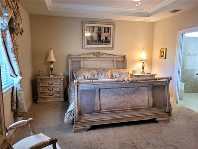 Stunning Pinnacle model overlooking the golf course and lake in - photo 10