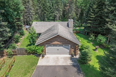 Set on 1.19 wooded acres in the heart of Sugar Camp, this 1,746 - photo 2