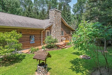 Set on 1.19 wooded acres in the heart of Sugar Camp, this 1,746 - photo 3
