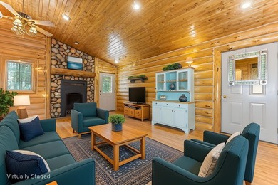 Set on 1.19 wooded acres in the heart of Sugar Camp, this 1,746 - photo 4