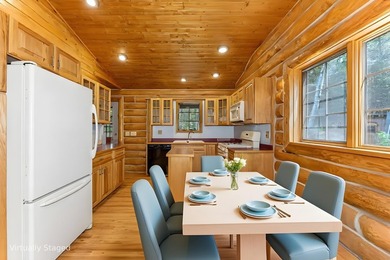 Set on 1.19 wooded acres in the heart of Sugar Camp, this 1,746 - photo 5