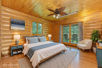 Set on 1.19 wooded acres in the heart of Sugar Camp, this 1,746 - photo 6
